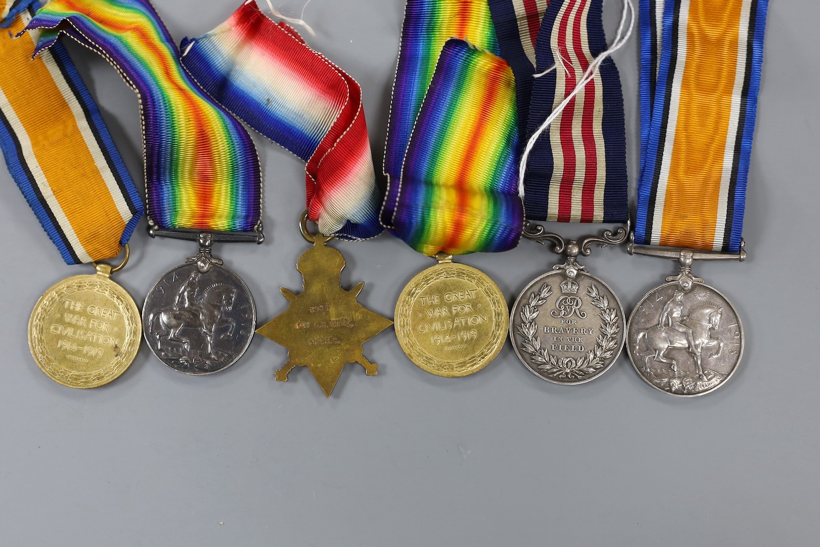 A WWI group of four including Bravery in the Field to Pte C.A. White, 12/KRRC and a pair to Hardware, Ches. Reg.